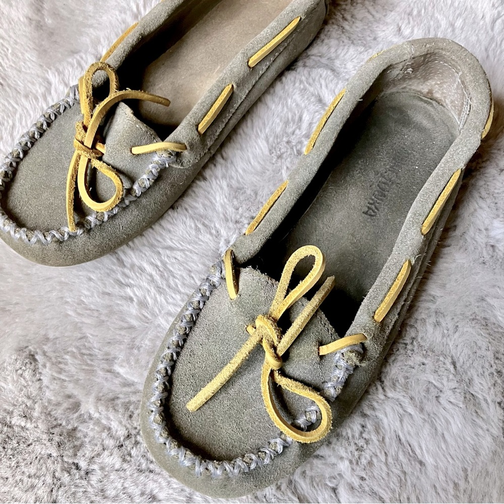 Genuine Leather Minnetonka moccasin flats in grey and yellow suede, rubber sole.